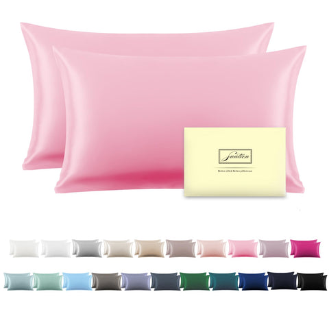 Suatien silk pillowcase pink close up fabric texture for smooth skin and hair.
