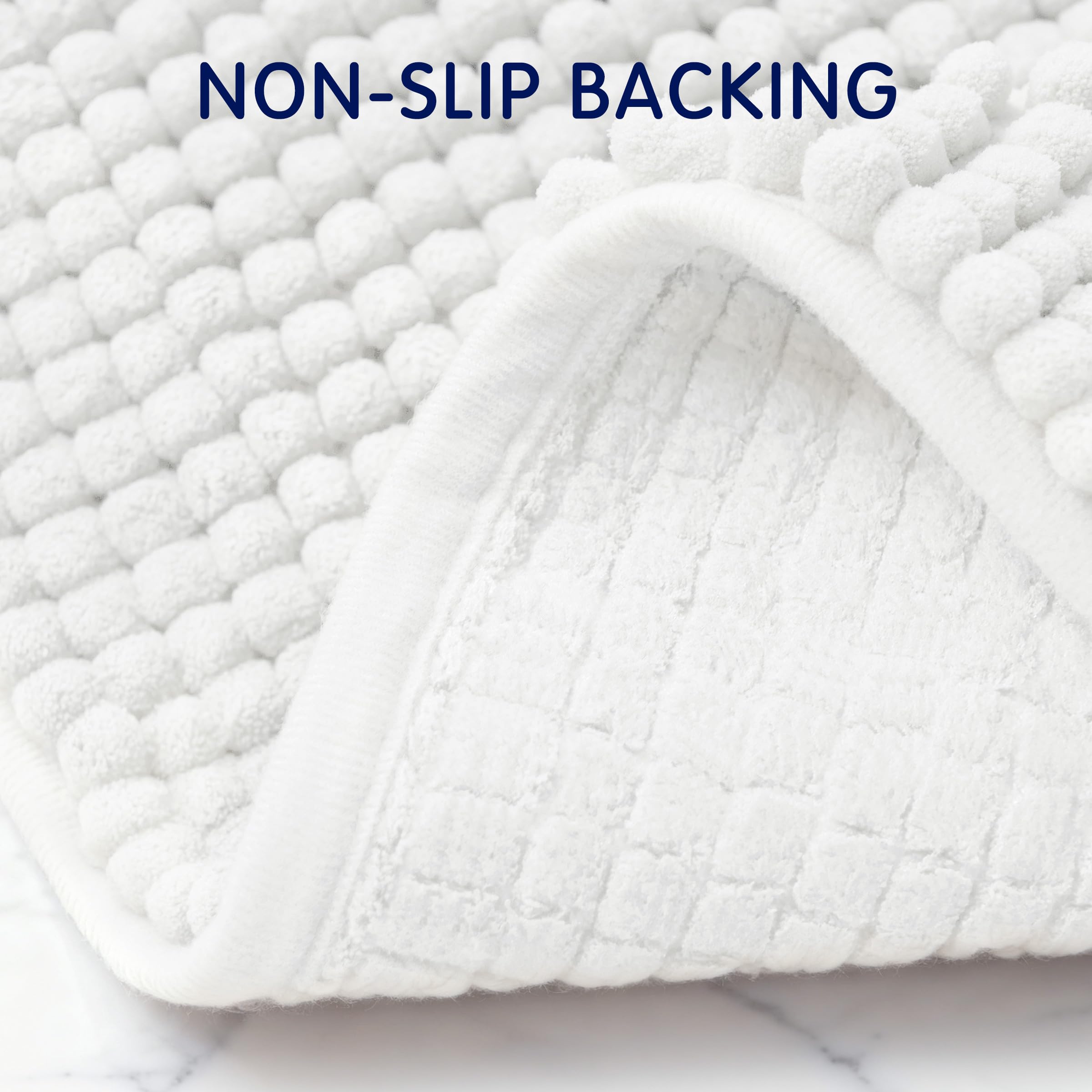 SUBRTEX bath rug reinforced edges maintain shape after washing.