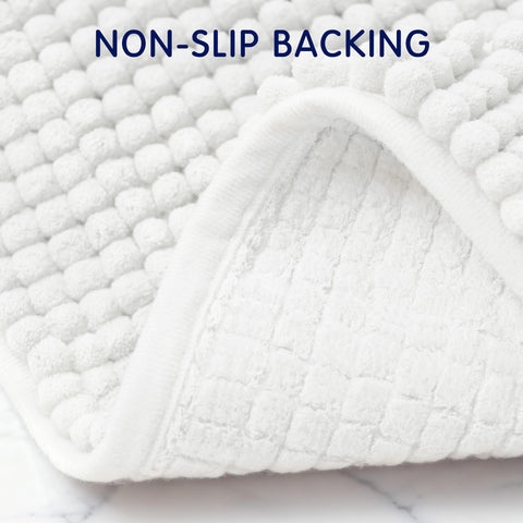 SUBRTEX bath rug reinforced edges maintain shape after washing.