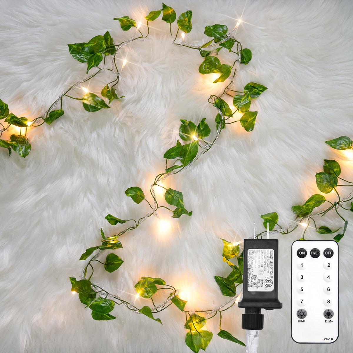 Suddus vine with fairy light plugged in for cozy bedroom ambiance.