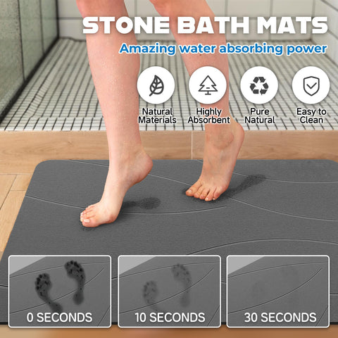 SUFOR dark grey diatomaceous earth mat absorbing water quickly from a wet bathroom floor.
