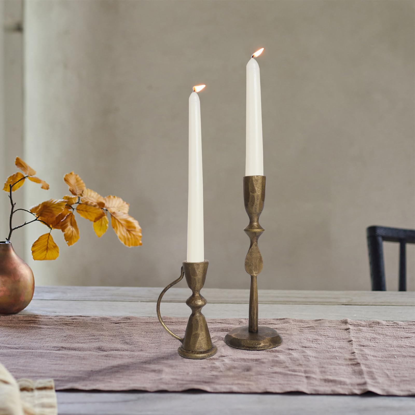 SUJUN dining table centerpiece setup with warm brass tones