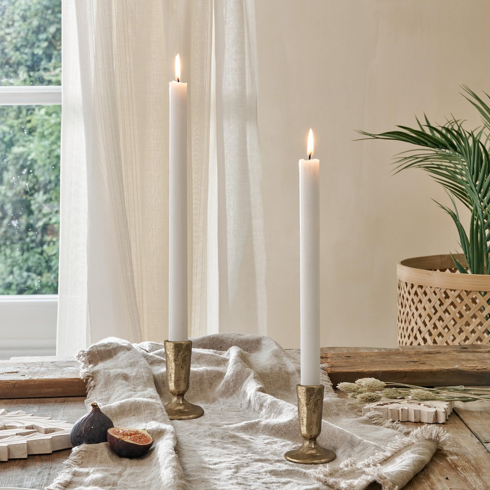 SUJUN dining-table centerpieces with taper candles invite warm, versatile ambience.