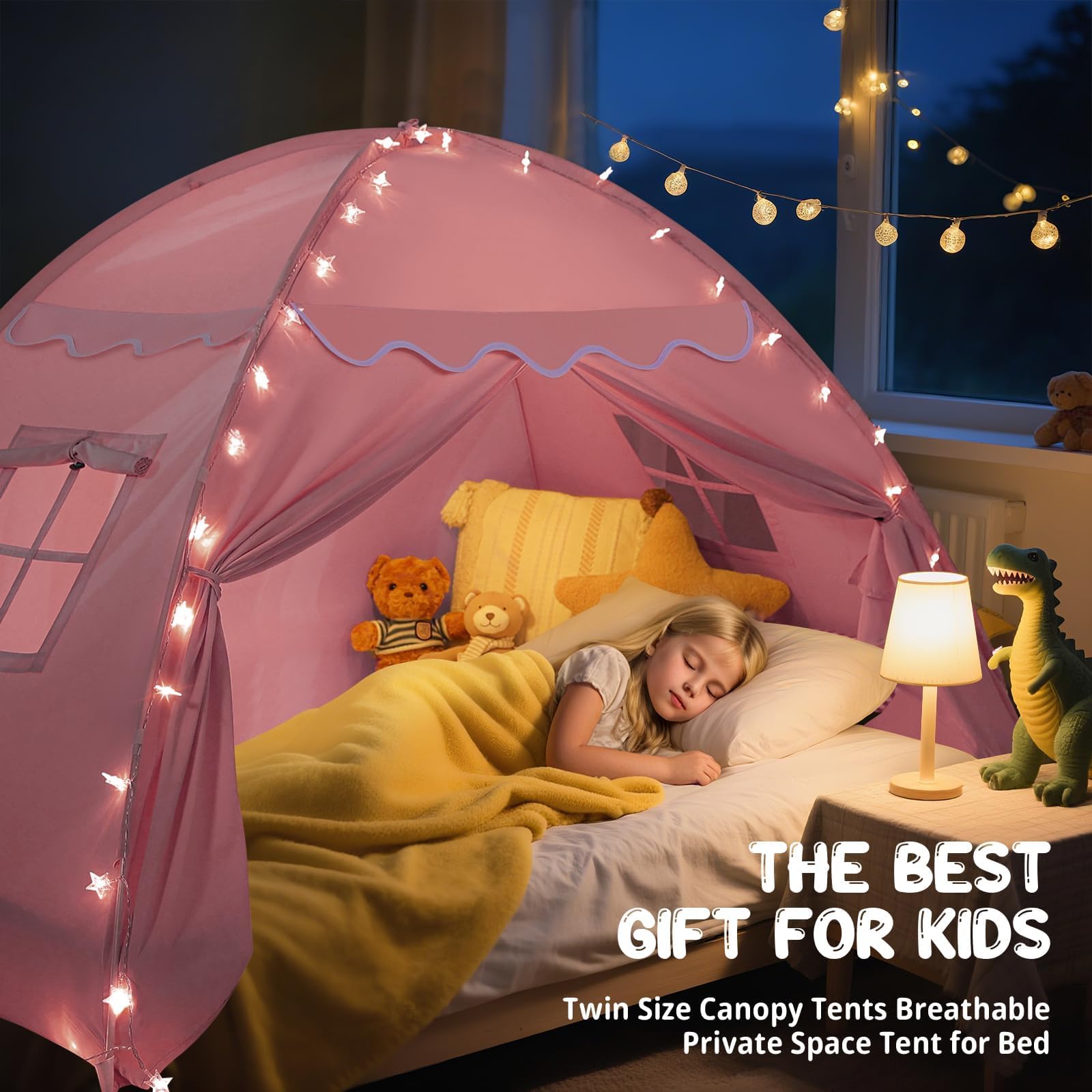 Sumbababy pink twin bed tent with decorative flags for a welcoming bedroom vibe