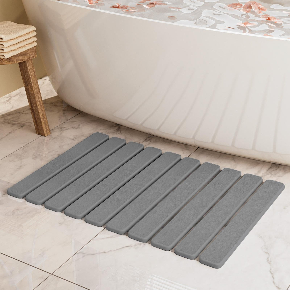 Summer&Kiss foldable stone bath mat with quick-dry surface for dry feet.