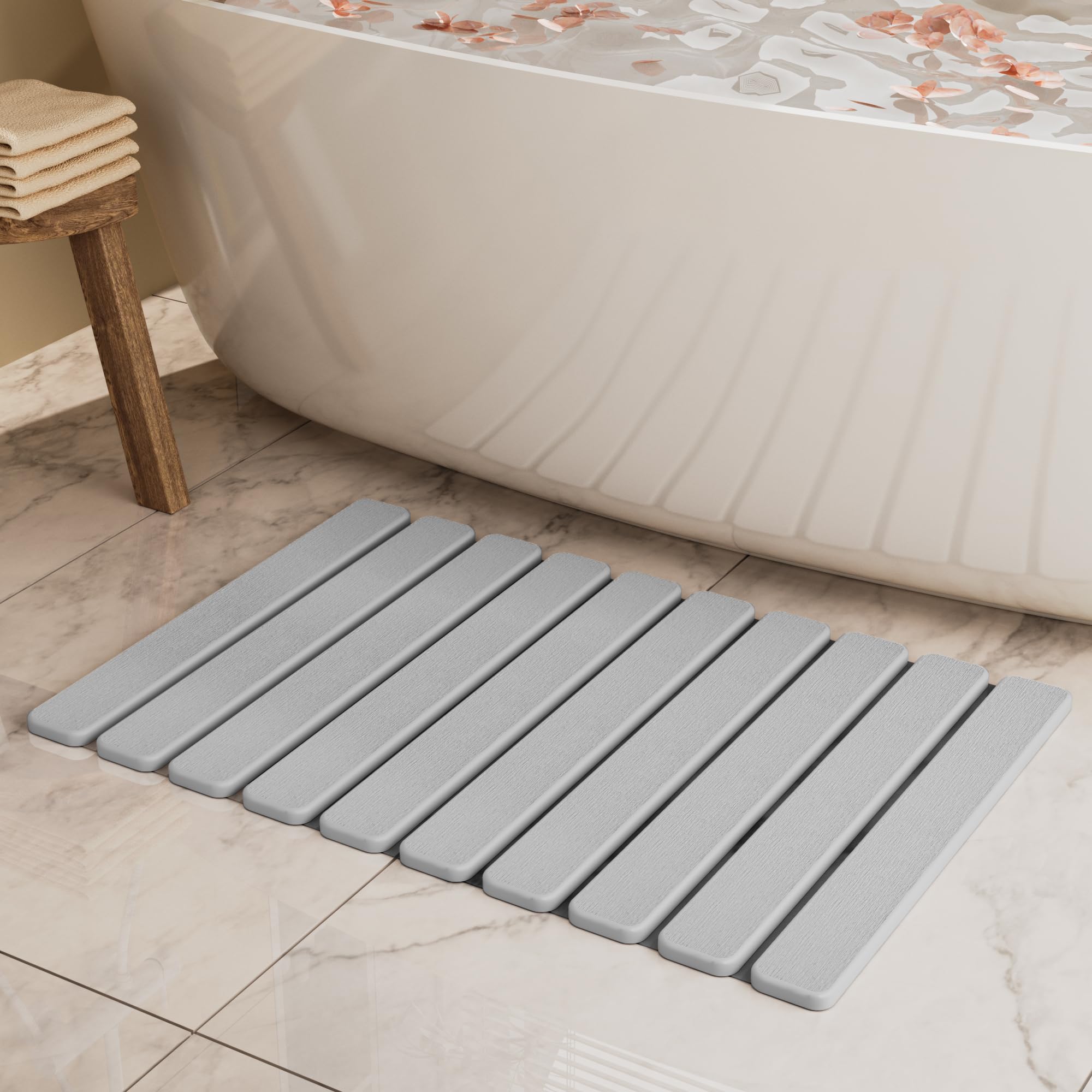 Summer&Kiss foldable stone bath mat folded for compact storage and quick drying.