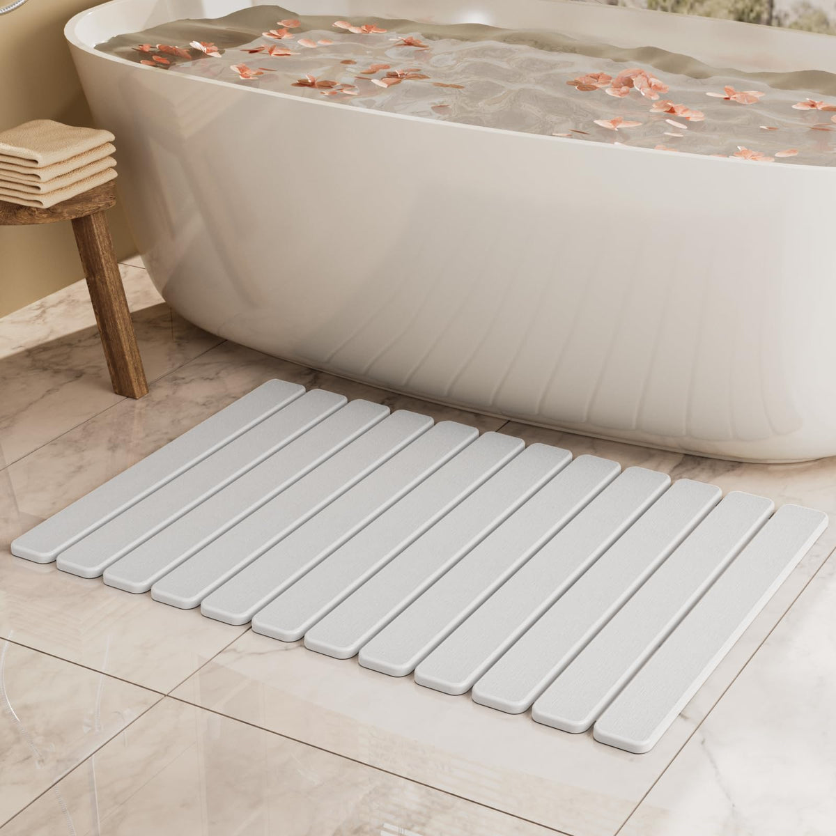 Summer&Kiss large stone bath mat folded for compact storage and easy transport.