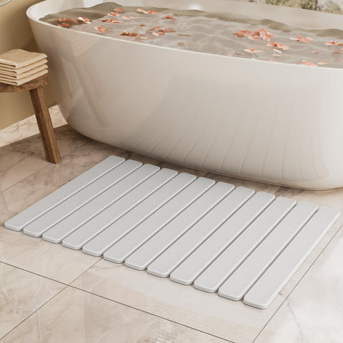 Summer&Kiss large stone bath mat folded for compact storage and easy transport.