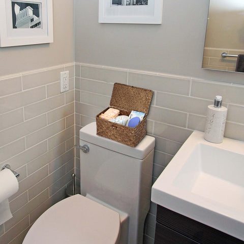 Sumnacon bathroom organizer in seagrass blends with coastal or rustic décor.
