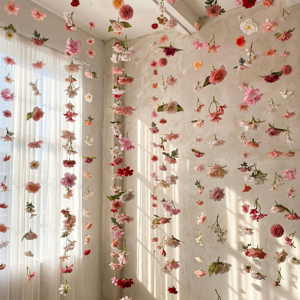 Suncalla pink flower garlands backdrop for festive events creates a soft romantic mood.