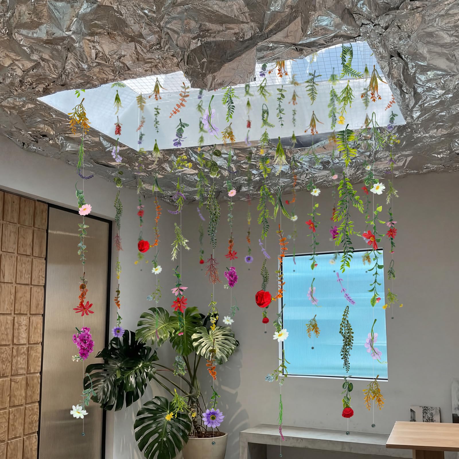 Suncalla garland styled as a table centerpiece with floral texture