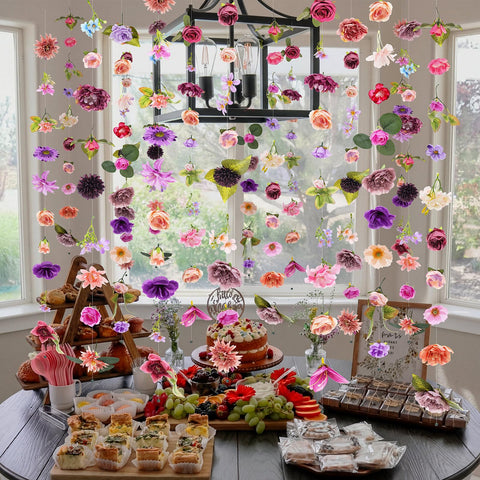 Suncalla table centerpiece garlands purple brighten receptions with color.