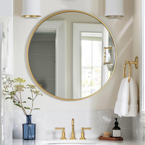 Sunniry Gold Round Mirror wall-mounted in bathroom for a clean, modern look.