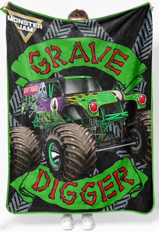 Sunny Side Up Monster Jam Grave Digger blanket shown for cozy bedtime use