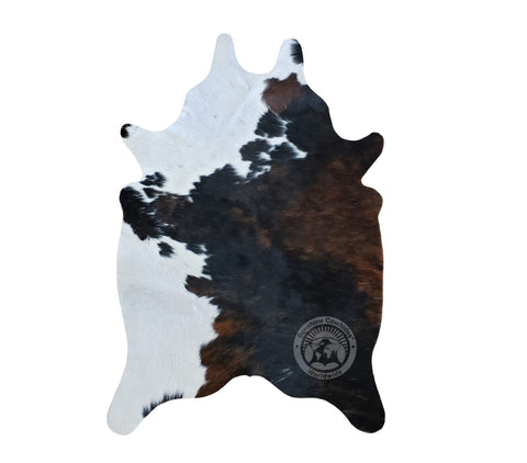 Sunshine Cowhides bedroom ambience adds cozy warmth underfoot.