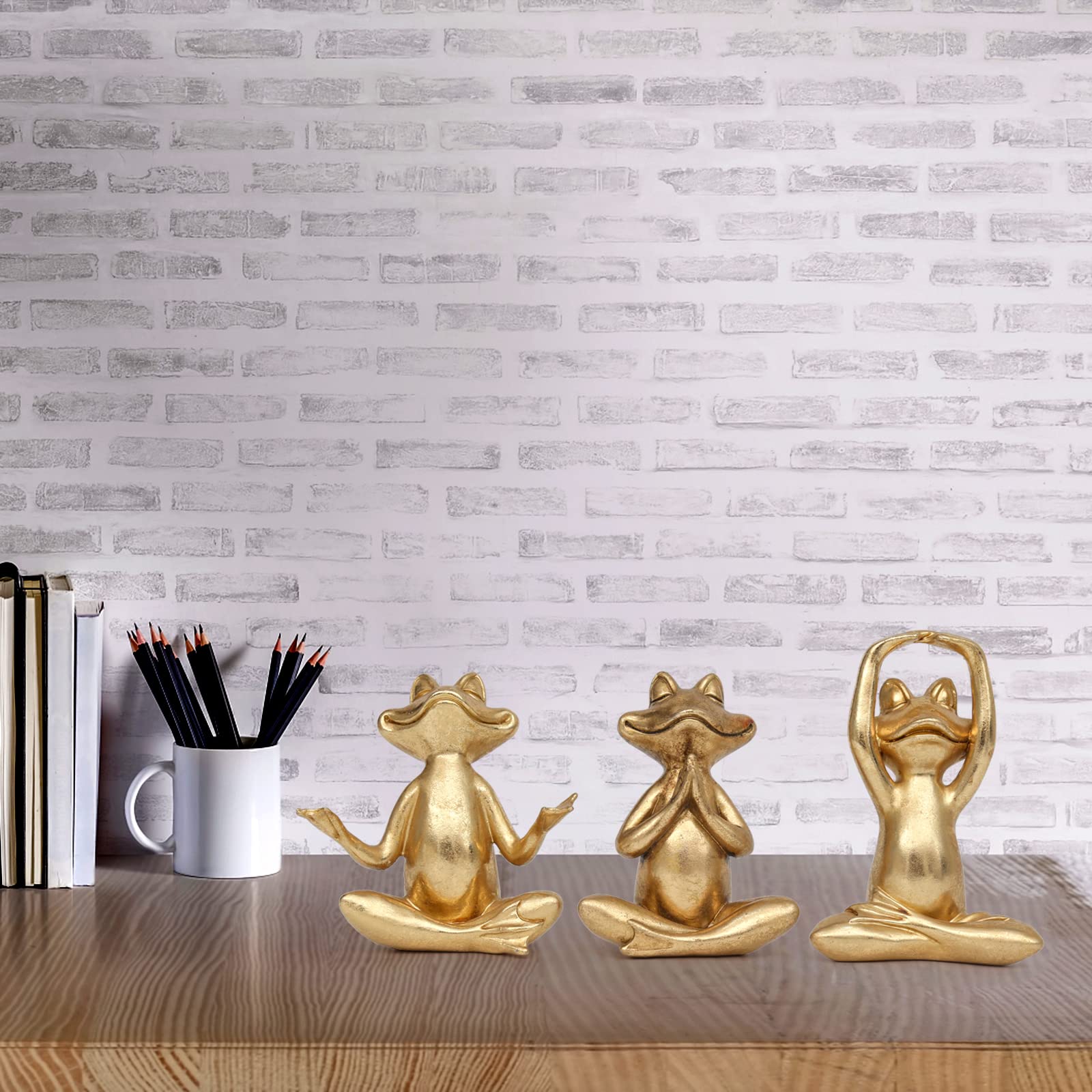 Suoed Gold Frog Figurines as desk decor for a modern workspace.