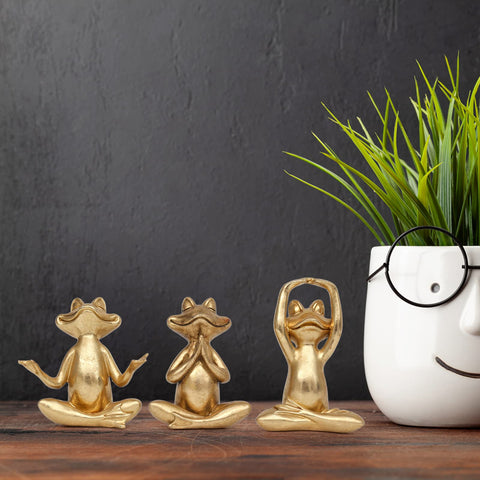 Suoed Gold Frog Figurines in tree pose enhance meditation corner ambiance.