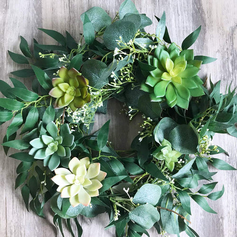 Supla garland draped along staircase for graceful transitions.