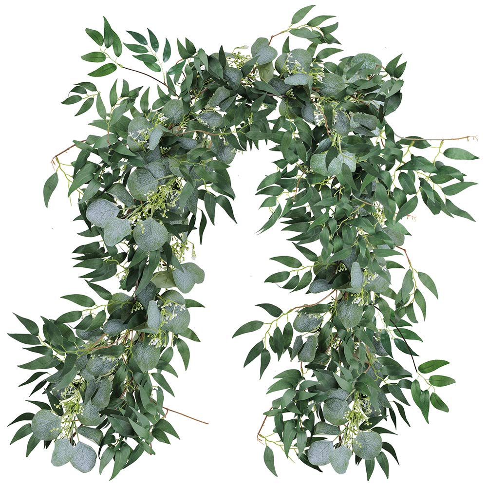 Supla mixed eucalyptus willow garland on arch for rustic wedding backdrop.