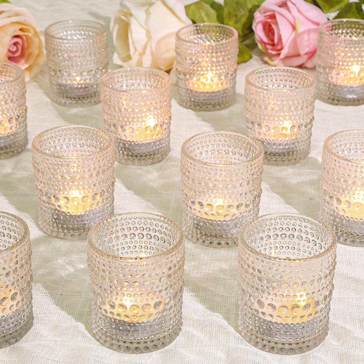 SUPMIND clear votive holders close-up highlighting elegant table décor