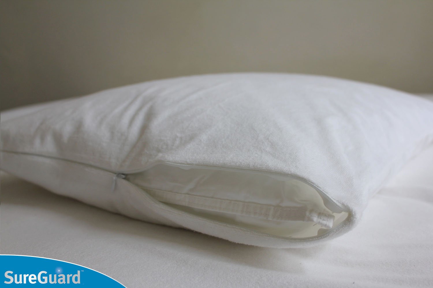 SureGuard pillow protector hypoallergenic layer blocks dust mites and dander.