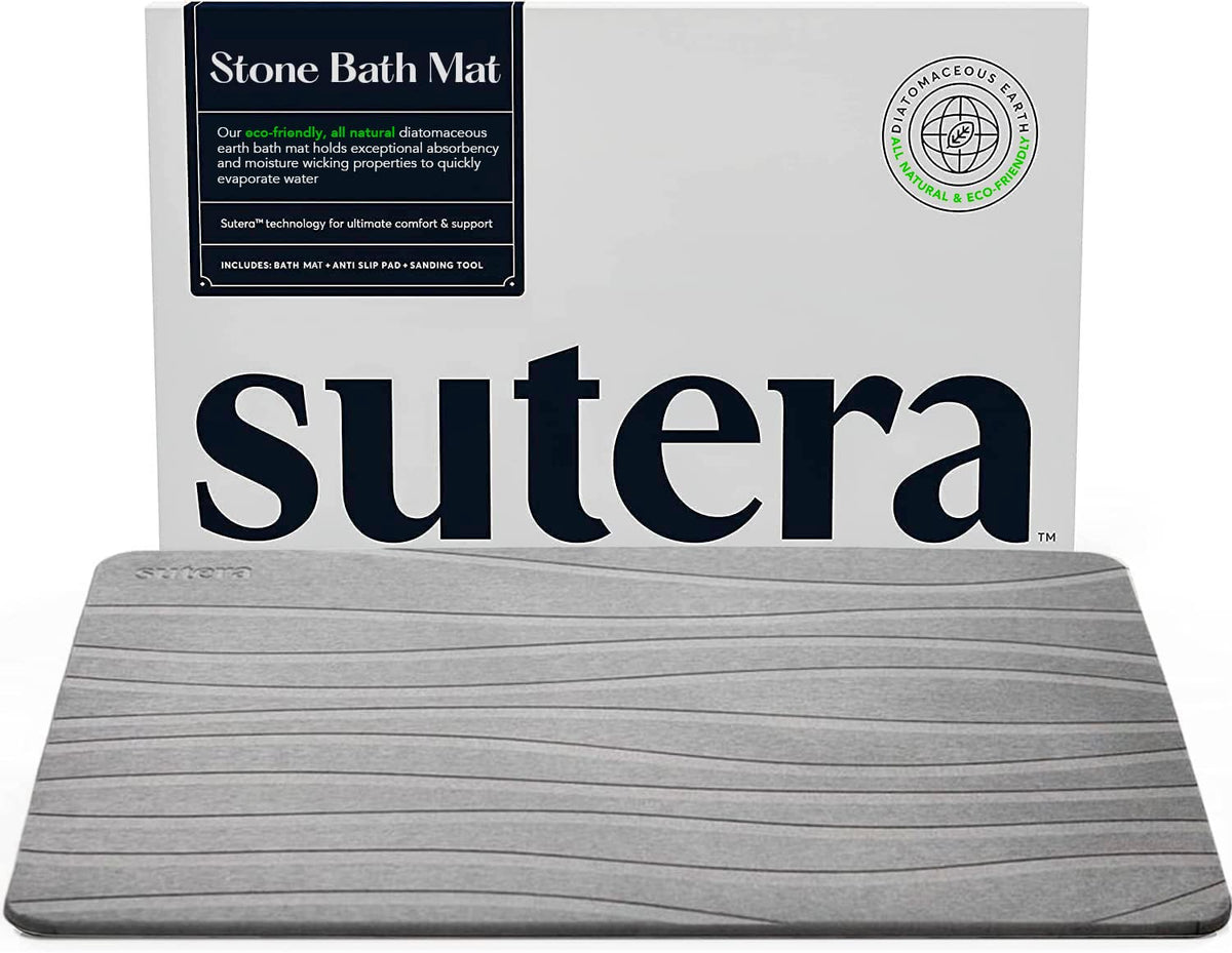 SUTERA Stone Bath Mat absorbency close-up shows rapid moisture uptake for dry floors.