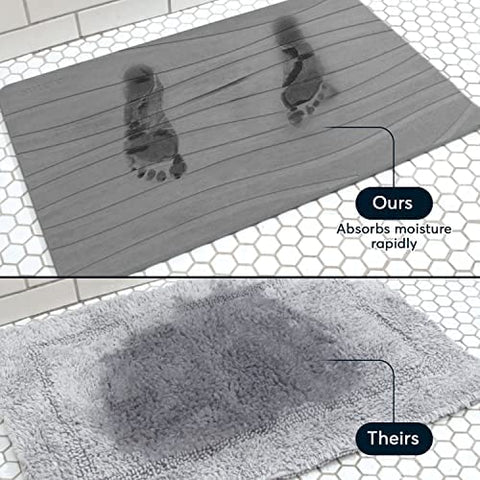 SUTERA Stone Bath Mat in a mudroom setup shows versatile placement.