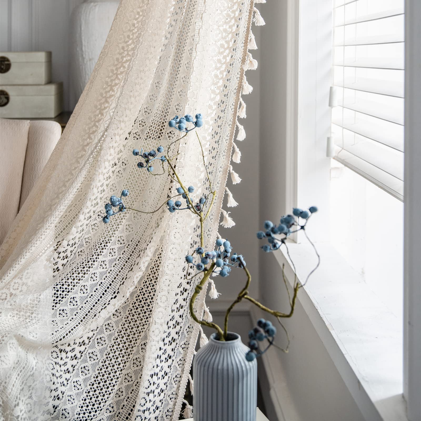 Sutuo Home living room setup with beige boho lace curtains creating warm atmosphere.