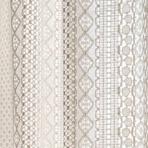 Sutuo Home sheer curtain filters light while preserving privacy.