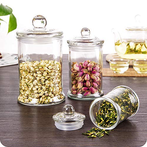 Suwimut glass apothecary jar for salt and nuts keeps snacks accessible.