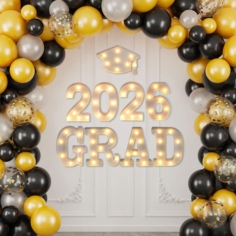 Suyeah Grad 2026 letters lit to enhance party mood.