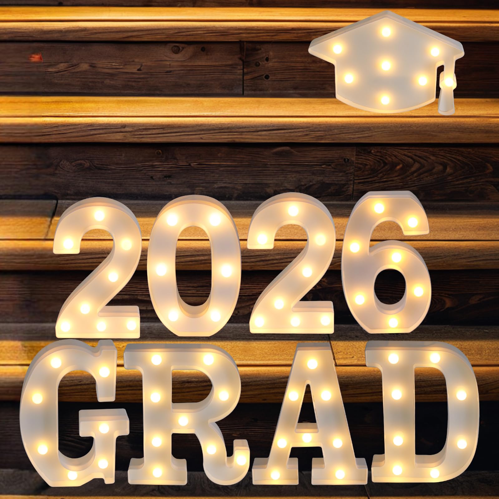 Suyeah Grad 2026 letters arranged on wall to create warm ambiance.