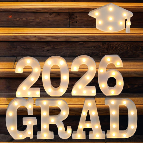 Suyeah Grad 2026 letters arranged on wall to create warm ambiance.