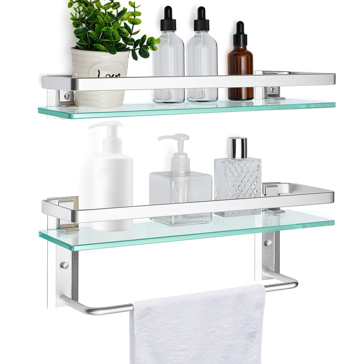 Suzile glass bathroom shelf with towel bar provides tidy towel storage.