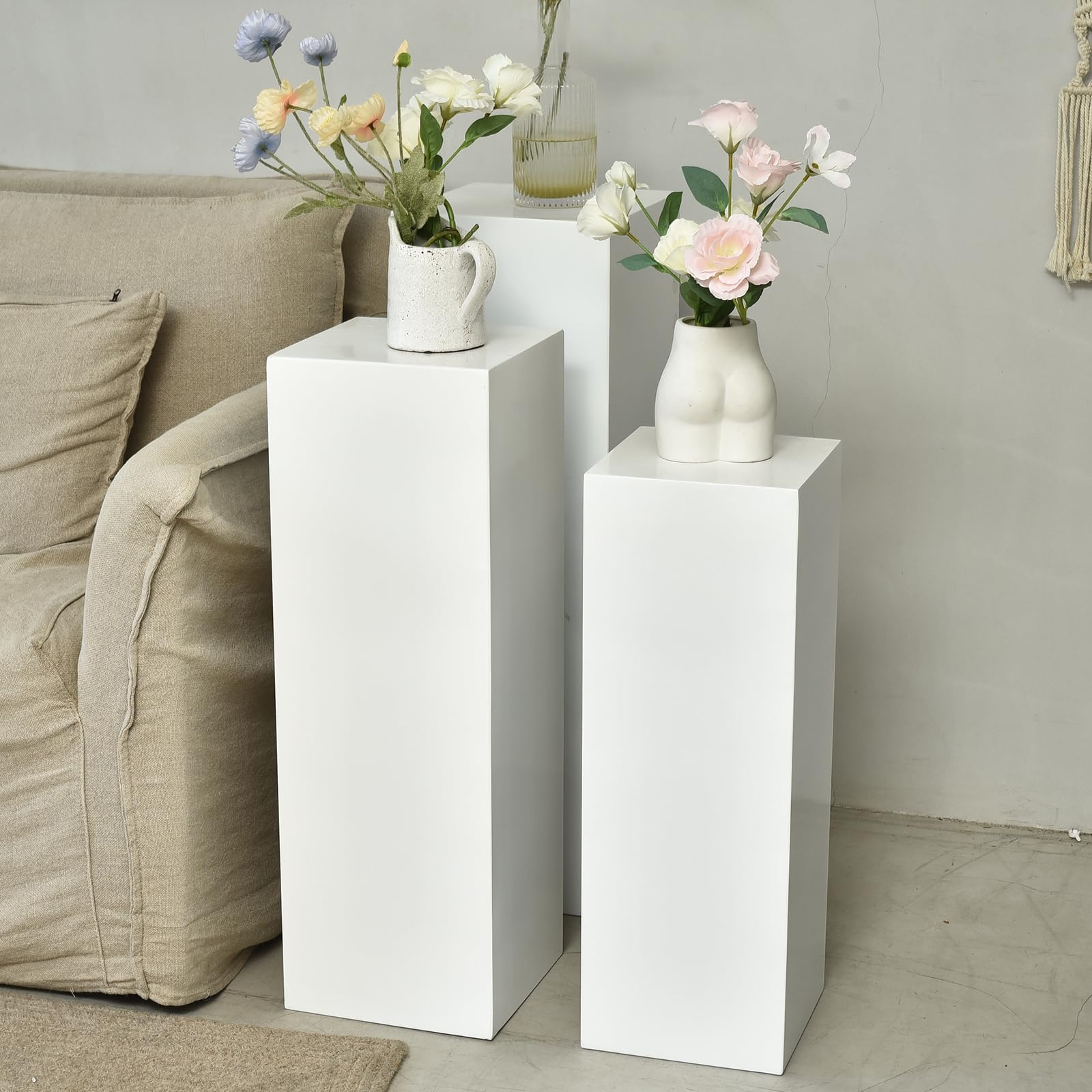 SwallowLiving white pedestal stand sculpture display elevates art pieces