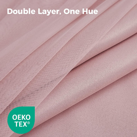 Close-up of Swandream grommets on pink curtains for smooth opening and closing.