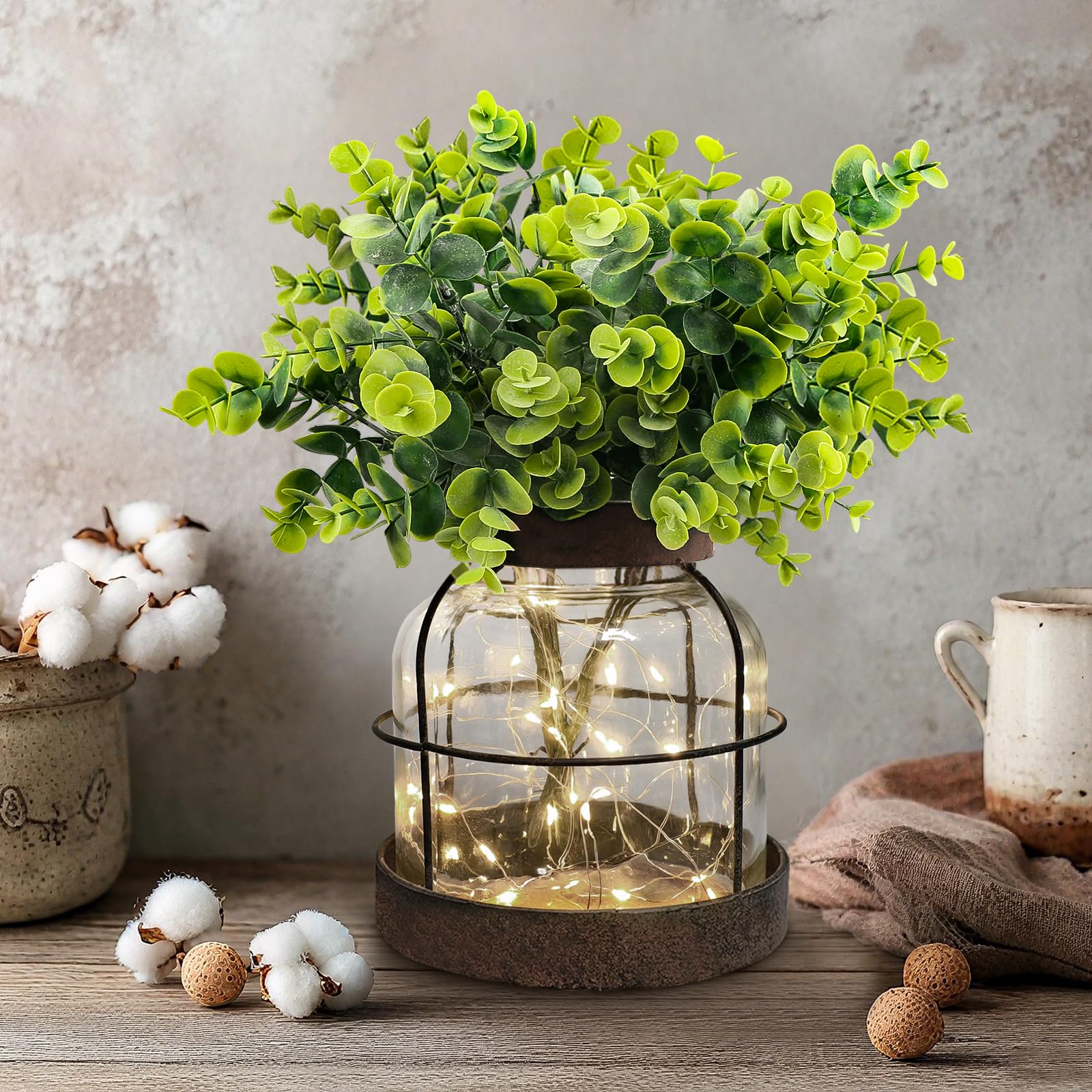 Swarenly artificial eucalyptus greenery; easily swap plants for seasonal décor.