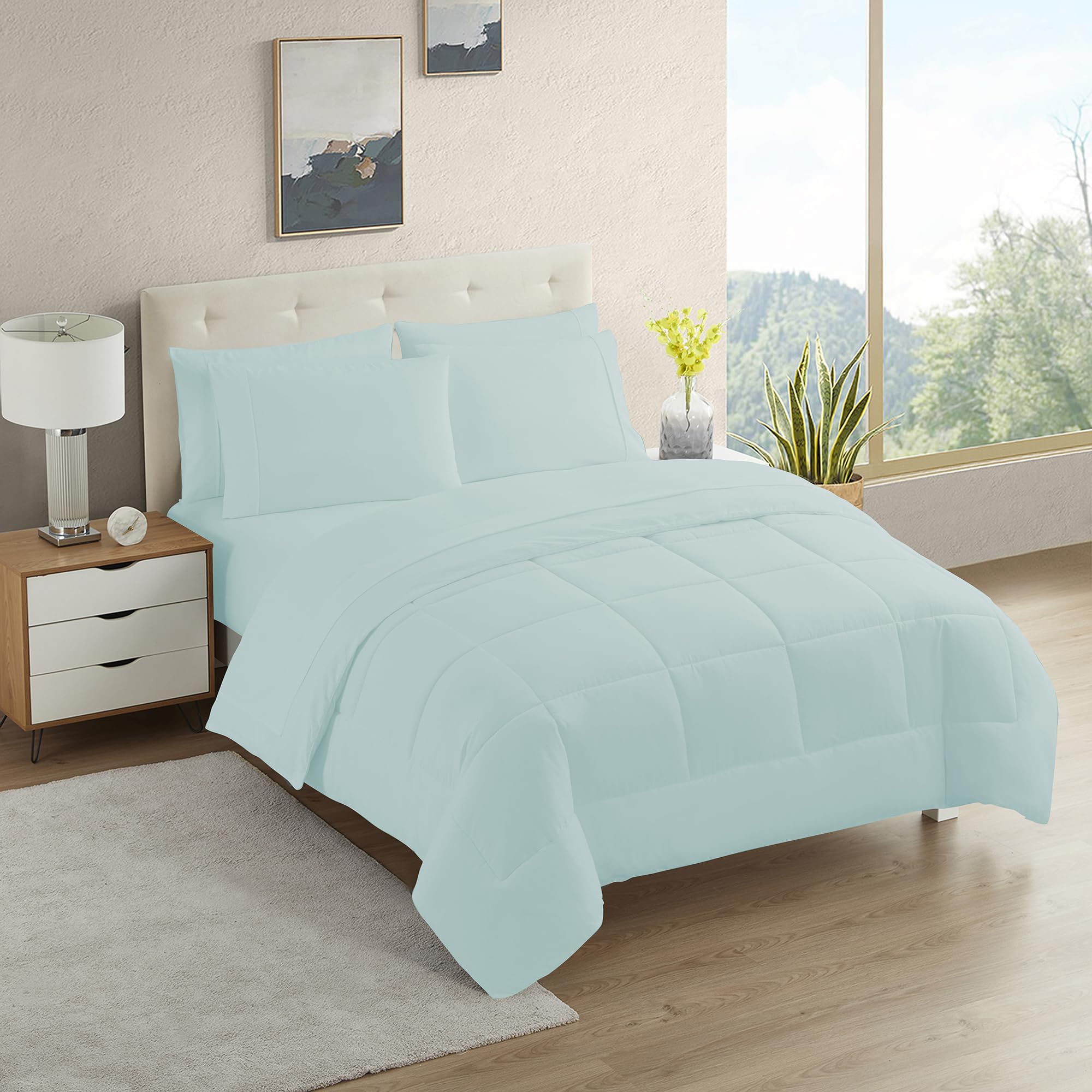 Sweet Home Collection Aqua twin comforter set on bed with all-season comfort.