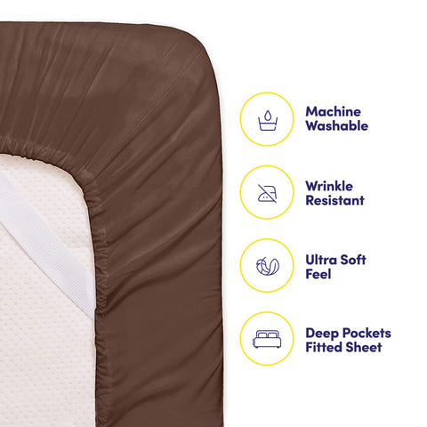 Sweet Home Collection deep-pocket fitted sheet on a bed.