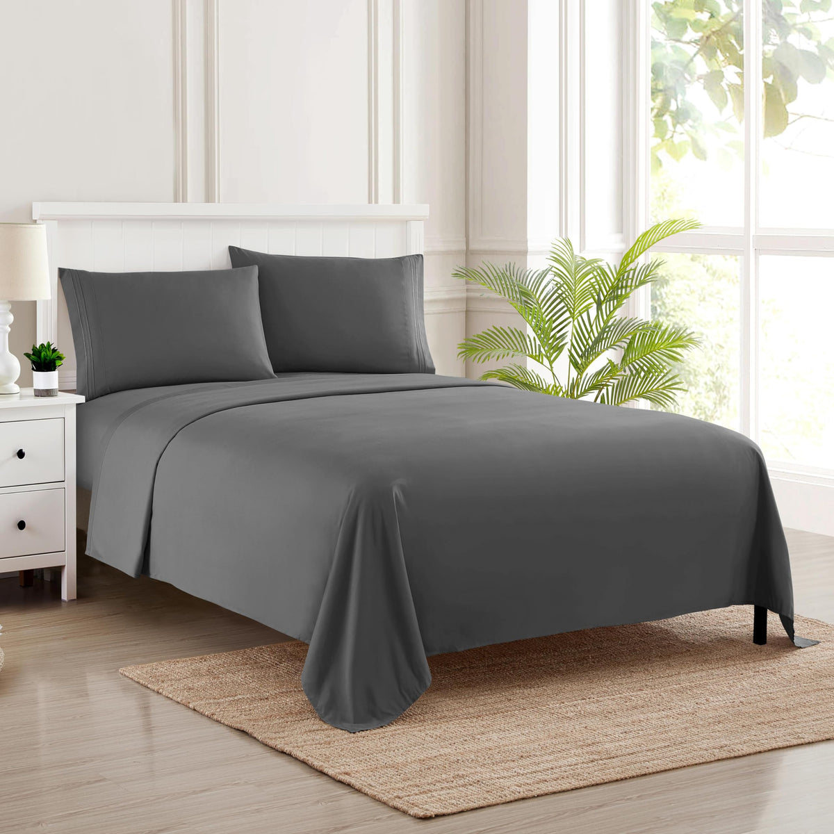 Sweet Home Collection queen sheets with elastic corners secure the fit on a deep mattress.