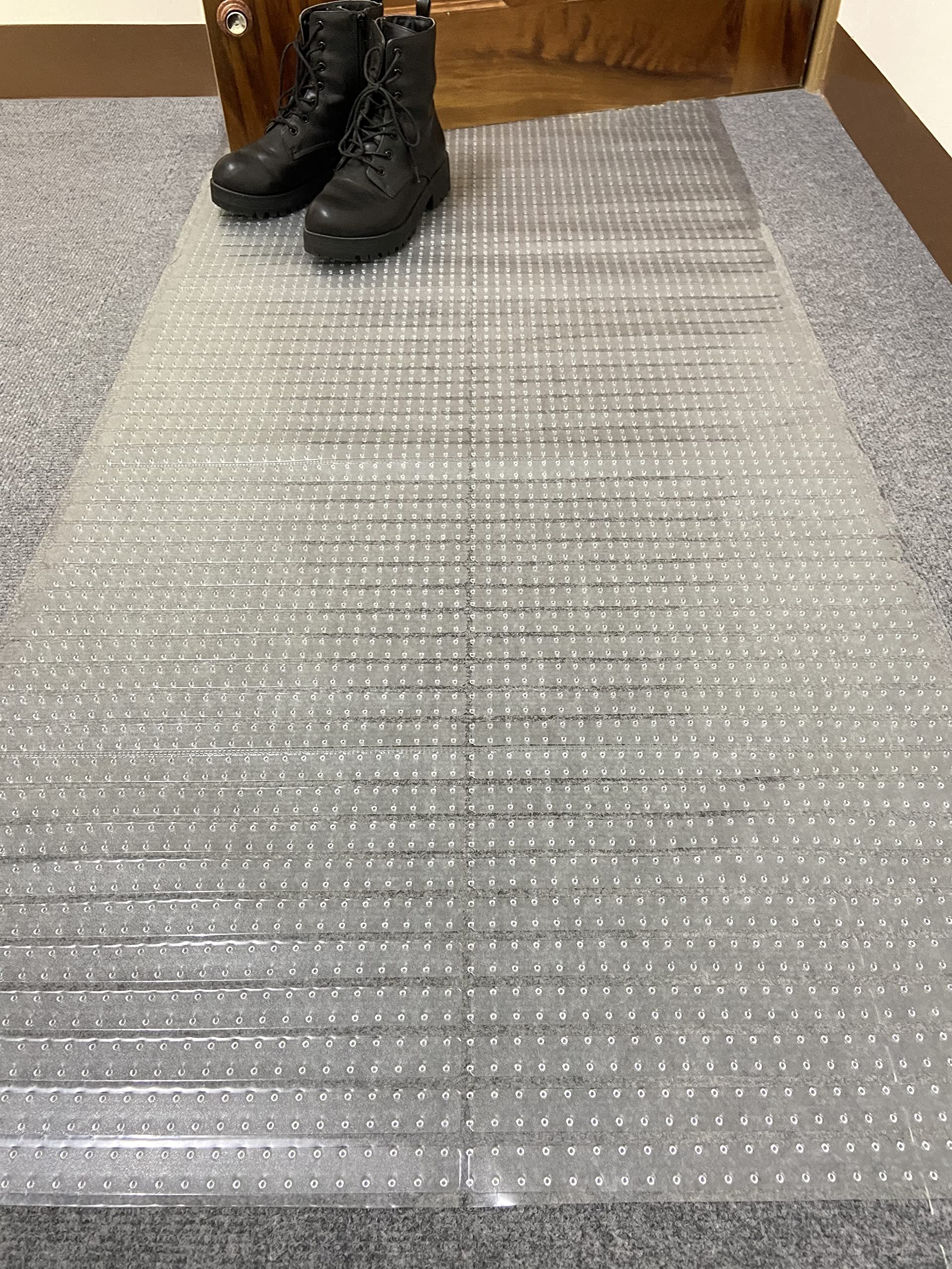Sweet Home Stores waterproof vinyl shields carpet fibers from spills.