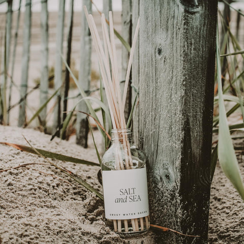 Sweet Water Decor diffuser near entryway greets guests with fragrance