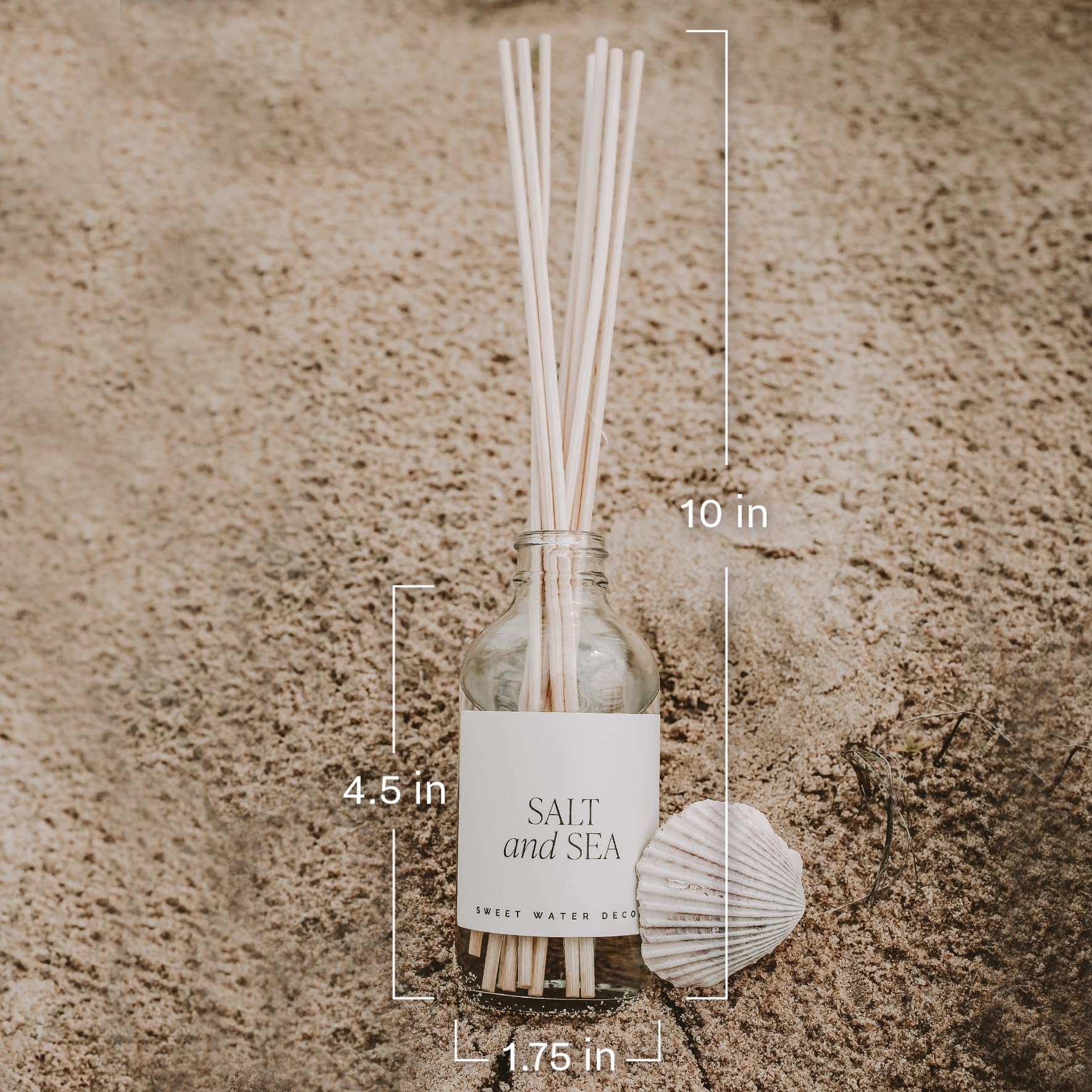 Sweet Water Decor diffuser bottle in living room setting adds sophistication