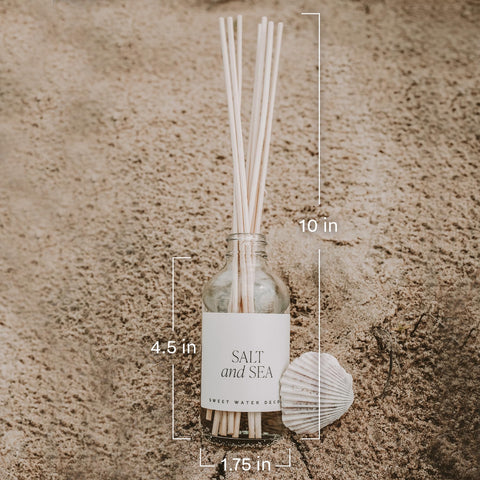 Sweet Water Decor diffuser bottle in living room setting adds sophistication