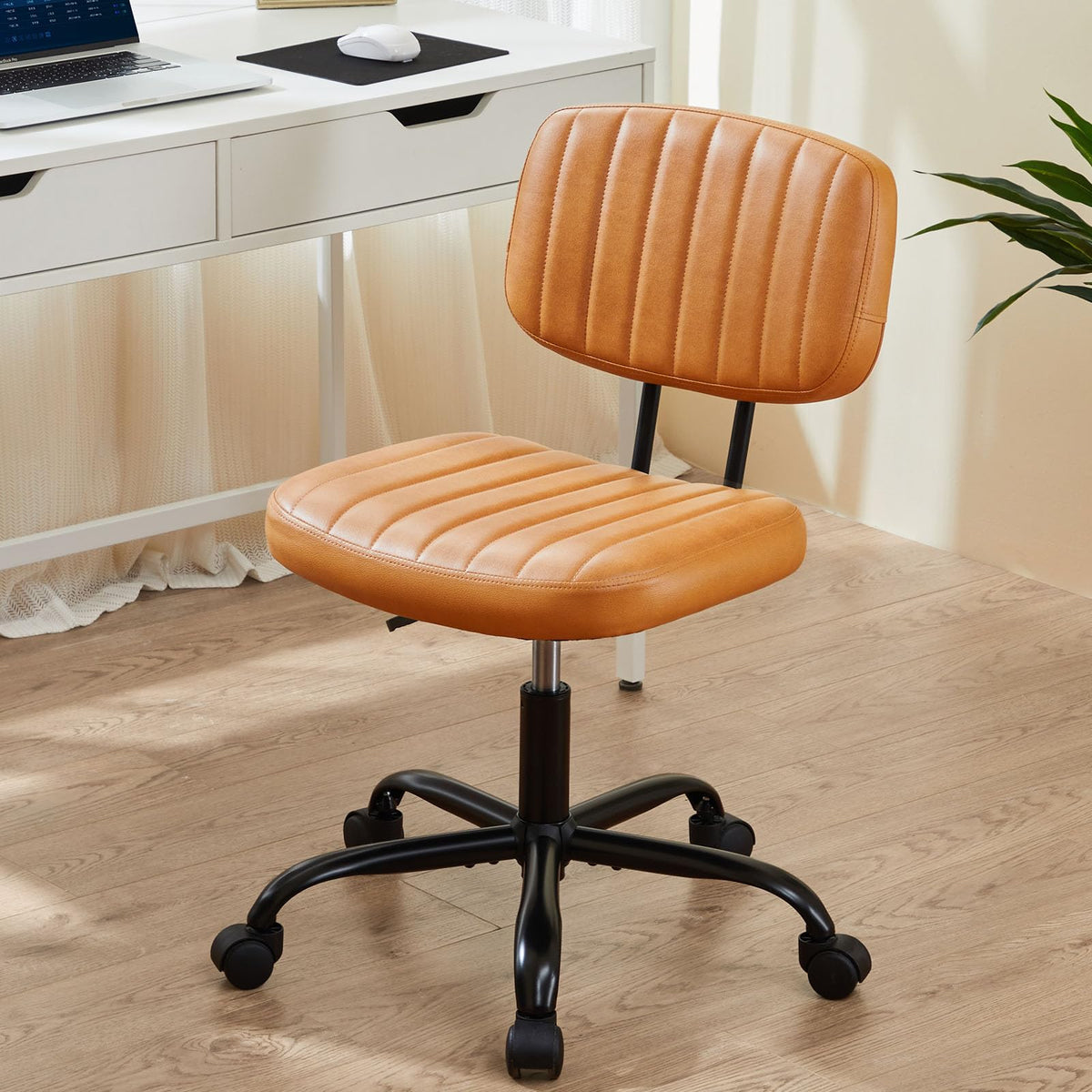 Sweetcrispy armless pu leather chair offers compact design and easy mobility