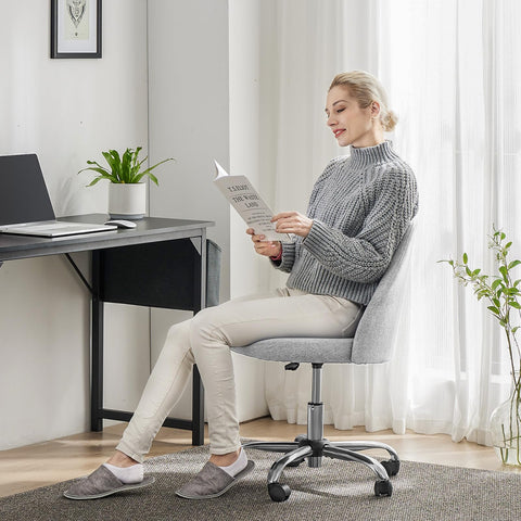 Sweetcrispy vanity chair room angle demonstrates space-saving design for small bedrooms.