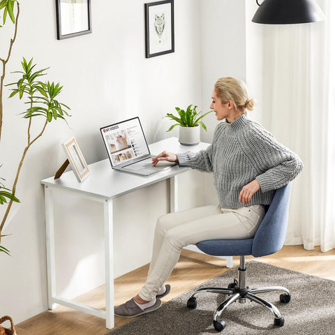 Sweetcrispy desk in bedroom fits small spaces for study or gaming.