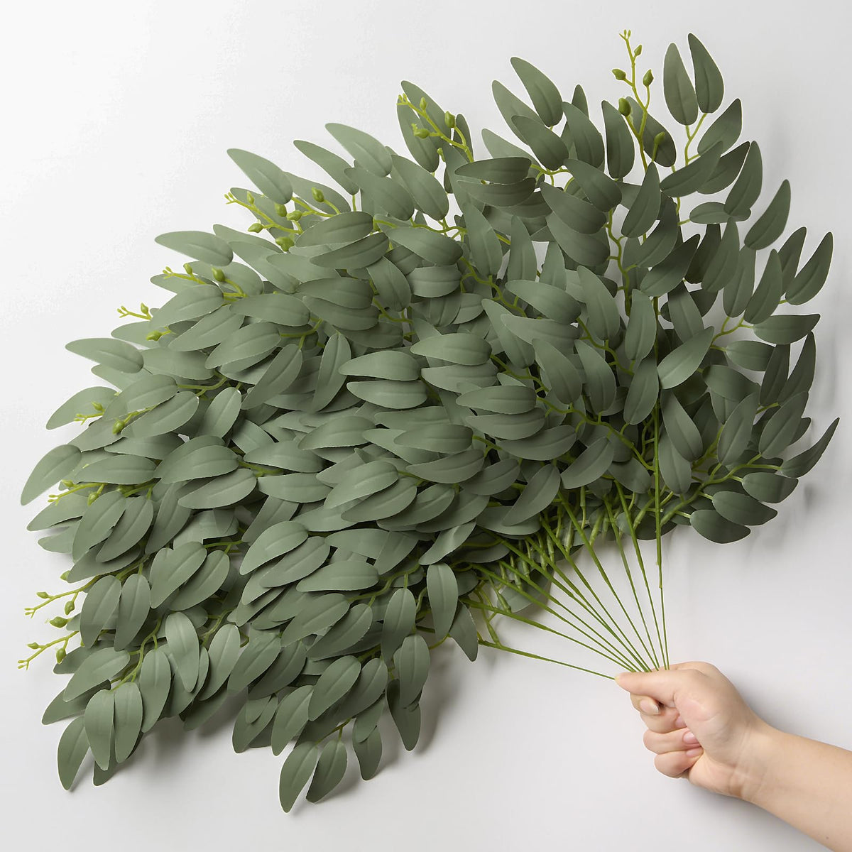 SWNAWE Italian Ruscus silk leaves close-up for realistic indoor greenery display.
