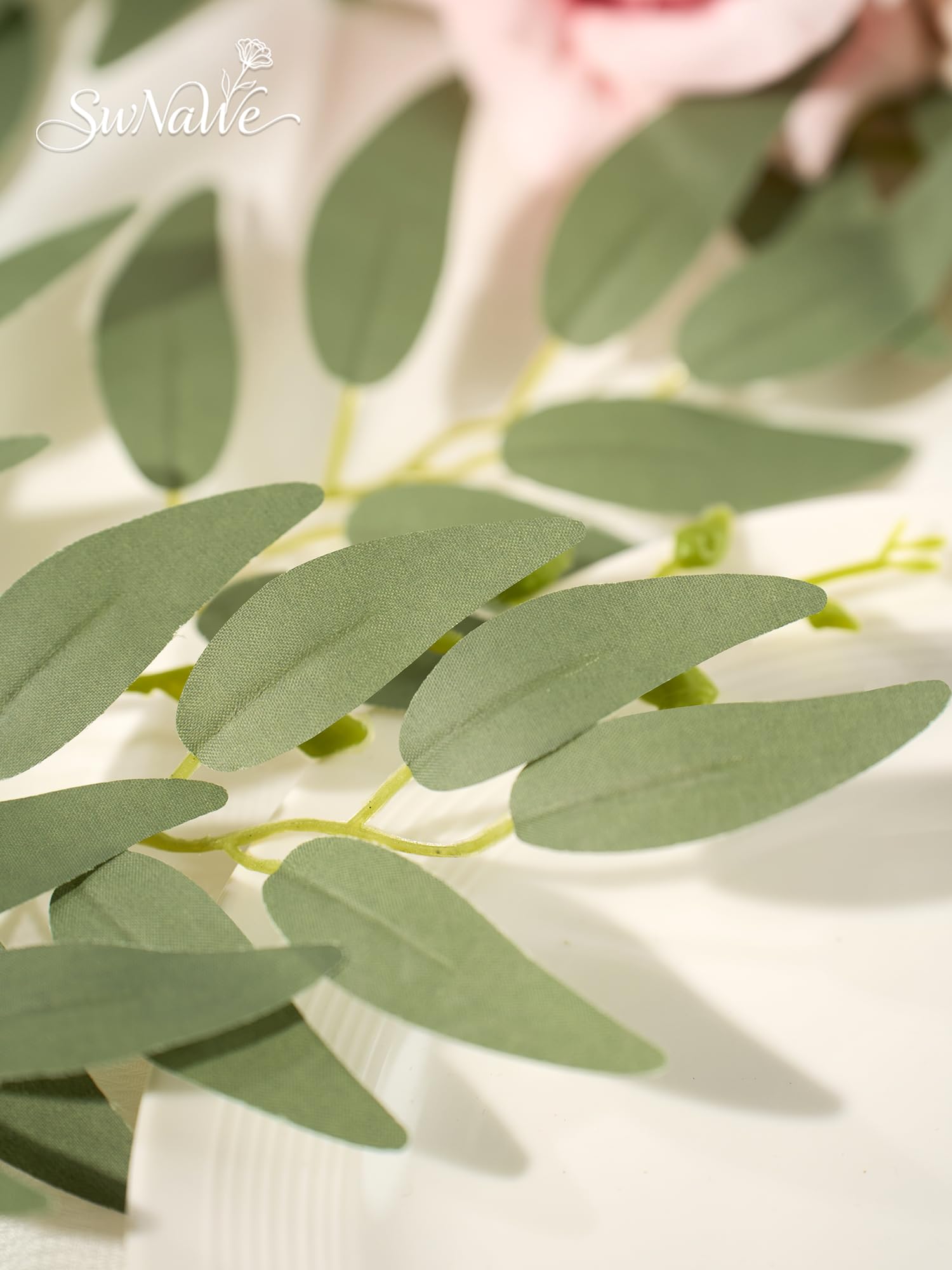 SWNAWE Italian Ruscus stem assembly showing full, adjustable branches for versatile arrangements.