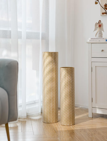 Sziqiqi decorative gold vase ideas include dried florals and natural branches.